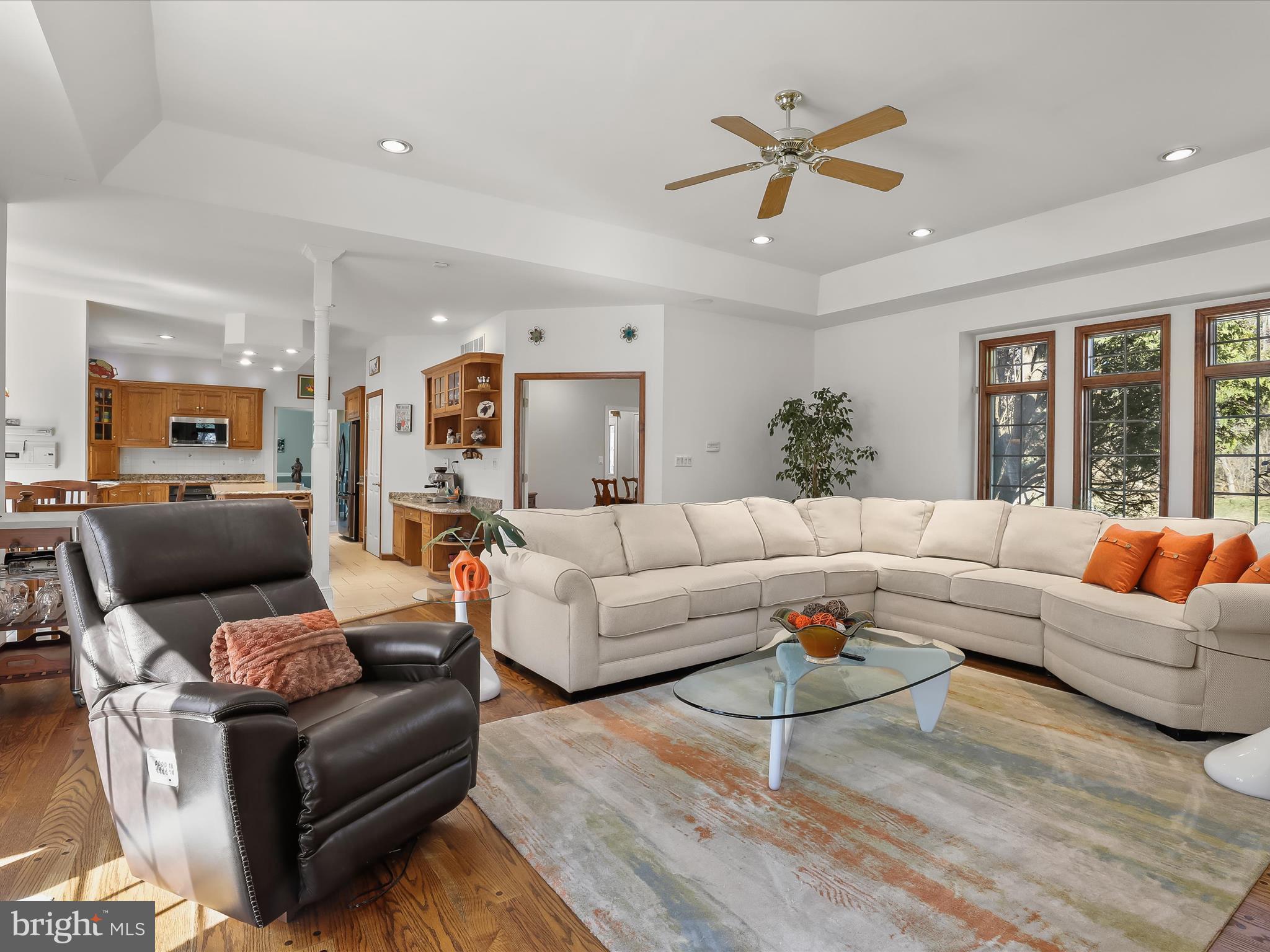 3155 Clarho Circle Finksburg, MD 21048 - Photo 20 of 70 a living room with furniture a ceiling fan and a large window
