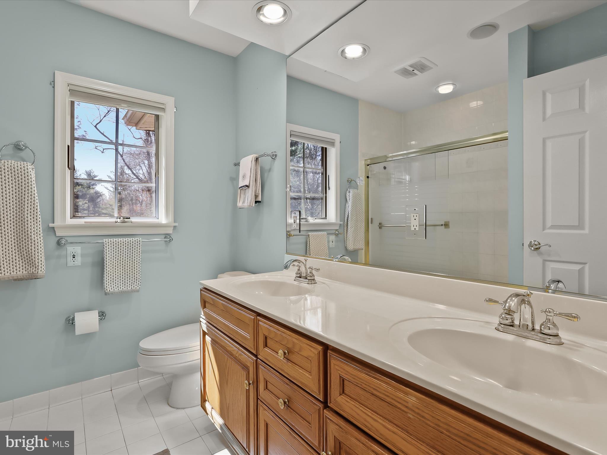 3155 Clarho Circle Finksburg, MD 21048 - Photo 34 of 70 a bathroom with a sink double vanity granite and a toilet