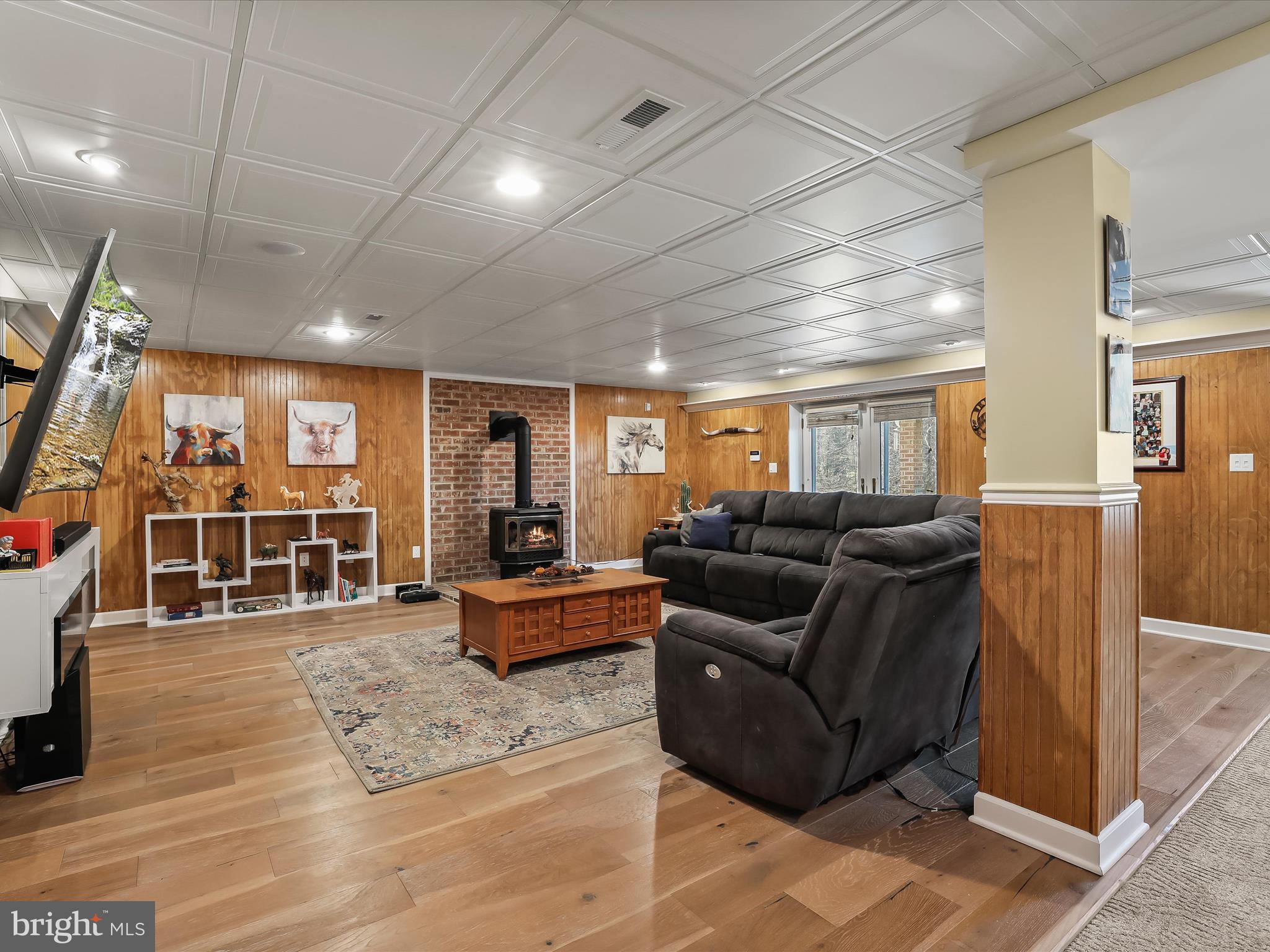 3155 Clarho Circle Finksburg, MD 21048 - Photo 42 of 70 a living room with furniture a flat screen tv and a large window