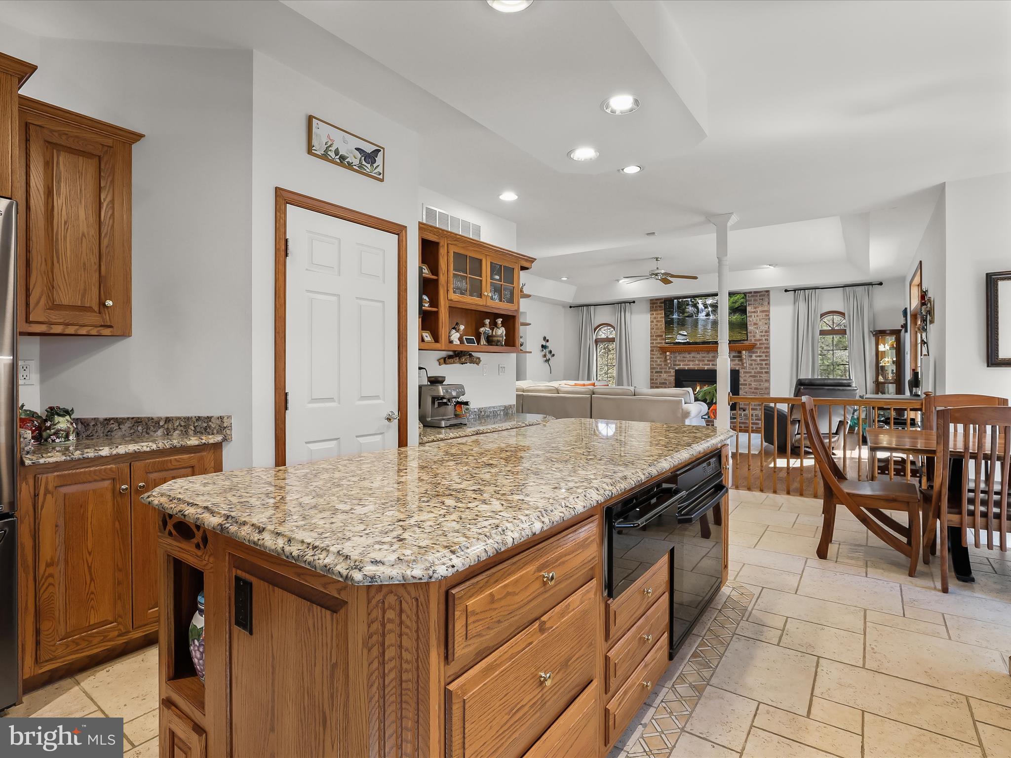 3155 Clarho Circle Finksburg, MD 21048 - Photo 10 of 70 a kitchen with granite countertop kitchen island stainless steel appliances a sink a counter top space and cabinets