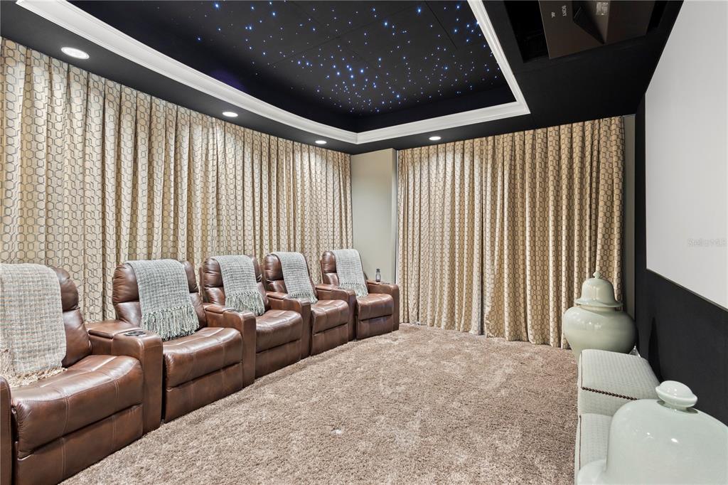 2251 Gulf Of Mexico Drive, Unit 203 Longboat Key, FL 34228 - Photo 17 of 21 a living room with furniture and a large window