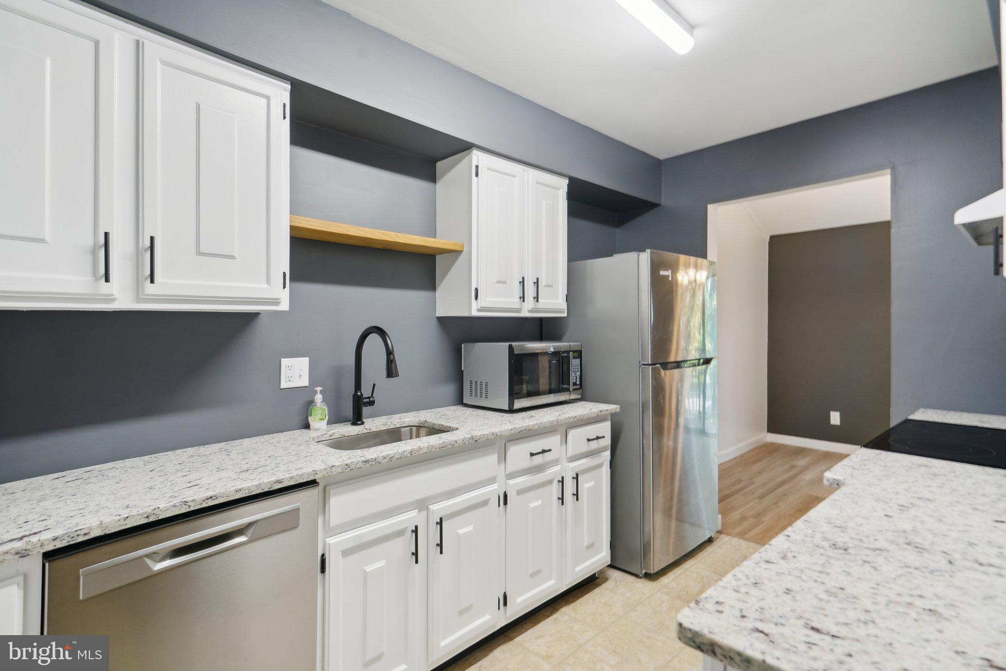 203 Cypress Point Circle Mount Laurel, NJ 08054 - Photo 9 of 21 Eye catching white cabinets and open shelving