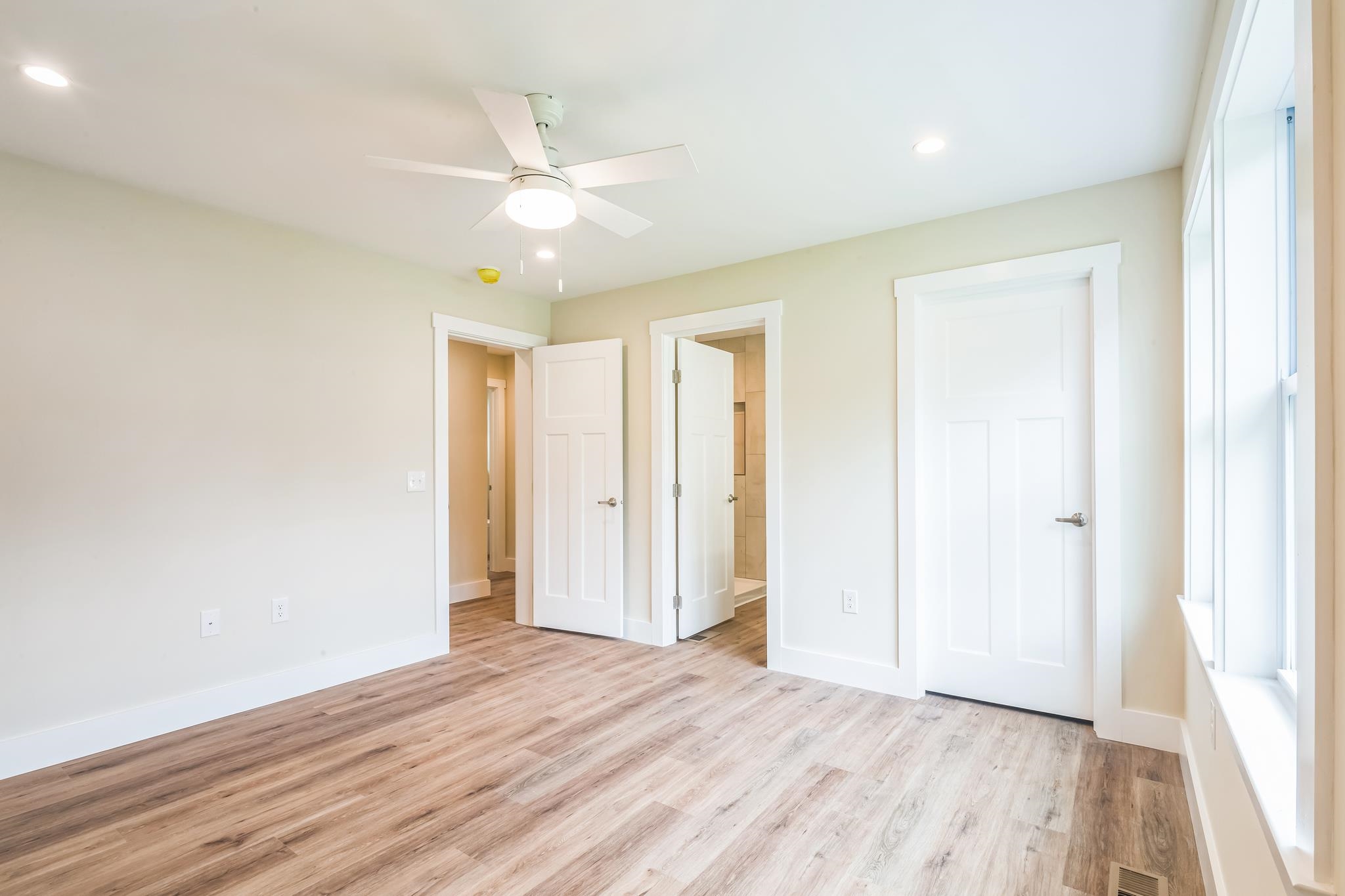 70 West Rising Sun Drive Ocean View, NJ 08230 - Photo 18 of 34 wooden floor in an empty room with a window
