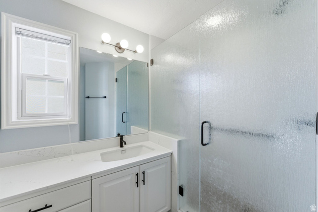 1041 West Grindelwald Court, Unit R5 Midway, UT 84049 - Photo 18 of 44 A private ensuite bathroom connected to the primary bedroom for added convenience and everyday functionality.