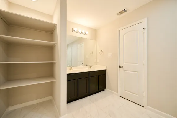 a spacious bathroom with a shower