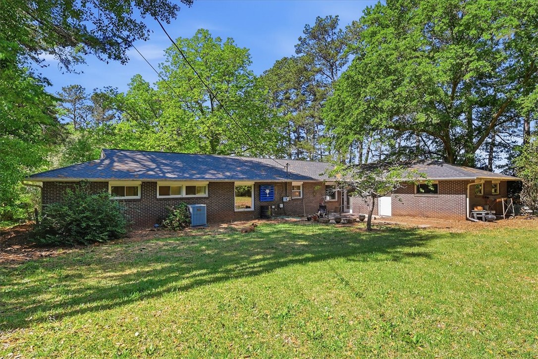 504 Jeb Stuart Avenue Anderson, SC 29621 - Photo 40 of 47 This brick ranch home offers a private yard with mature trees.