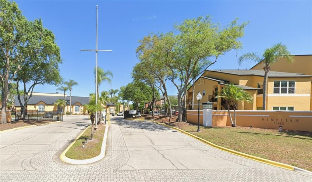 a view of outdoor space yard and swimming pool