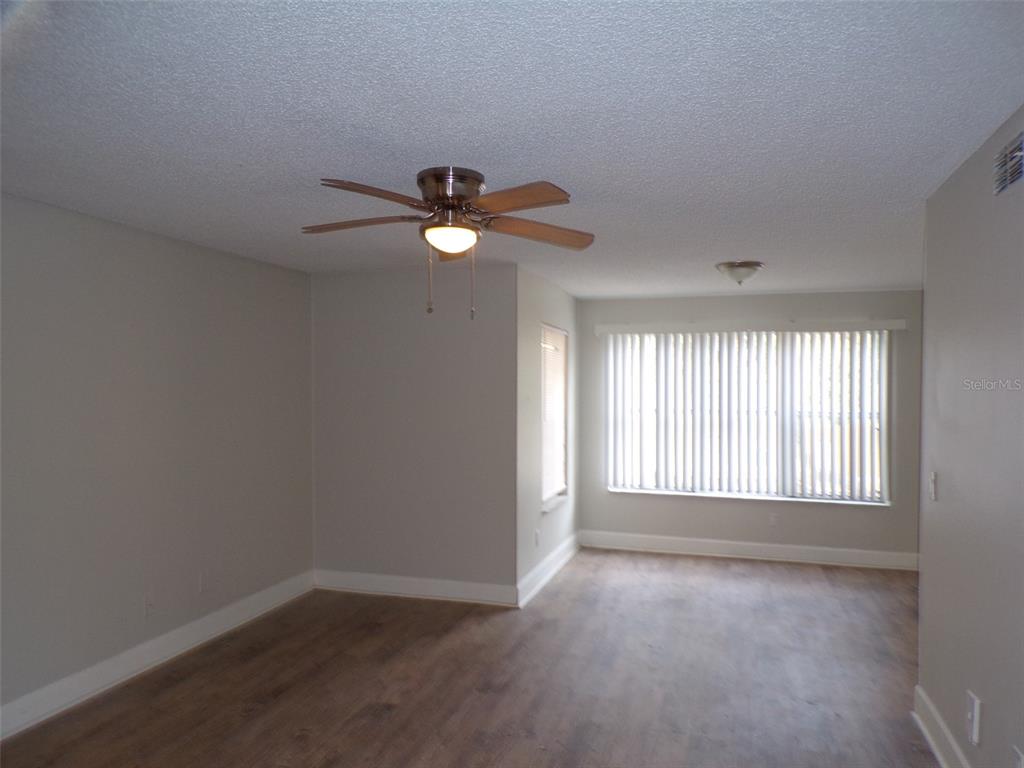 4518 Commander Drive, Unit 1921 Orlando, FL 32822 - Photo 17 of 18 an empty room with window