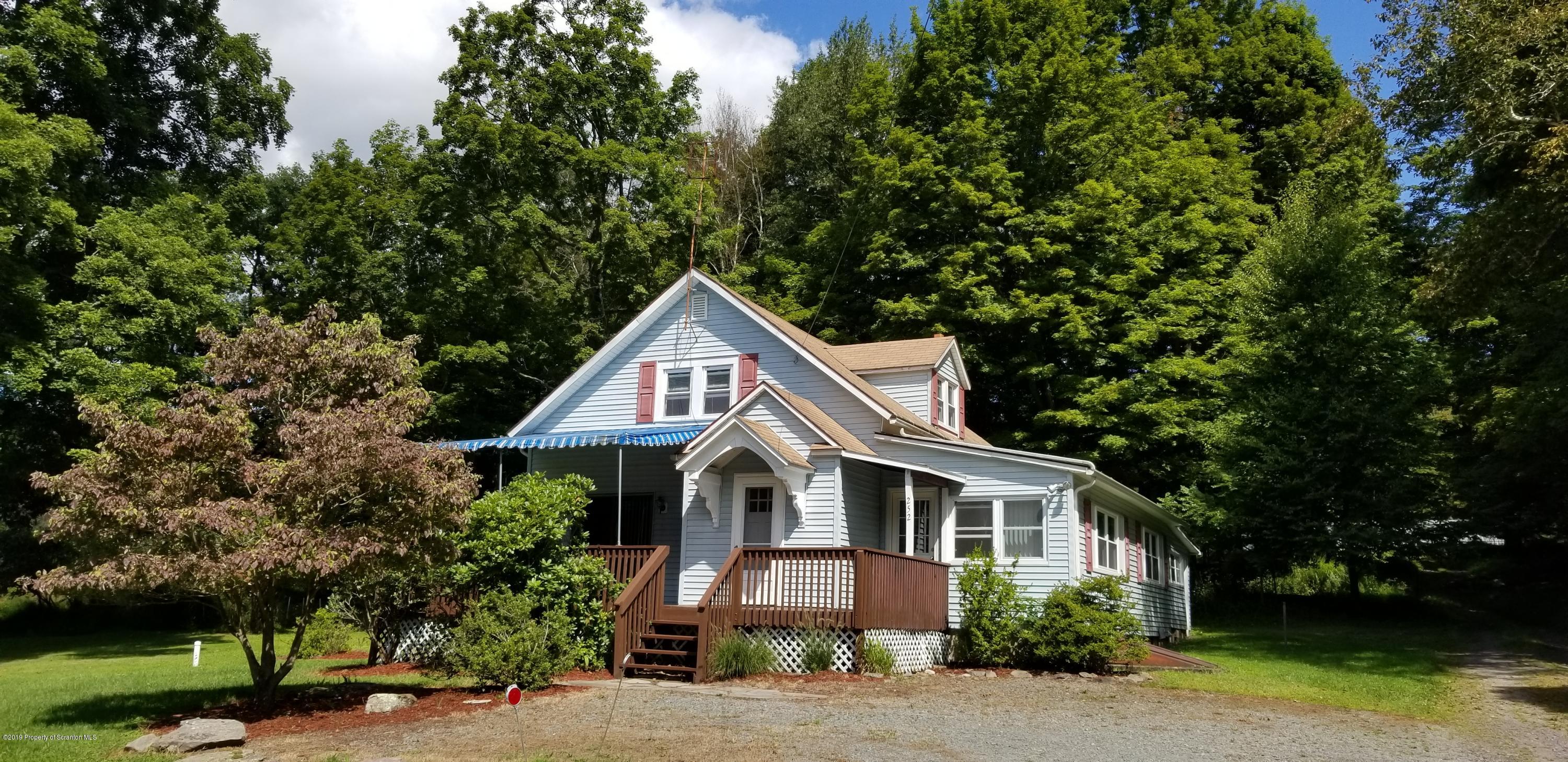 252 School House Road Tunkhannock, PA 18657 - Photo 19 of 20 a front view of a house with a yard