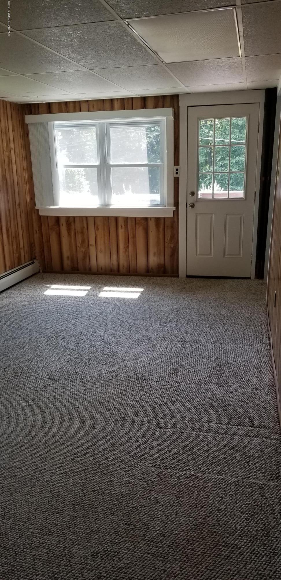 252 School House Road Tunkhannock, PA 18657 - Photo 3 of 20 an empty room with a window