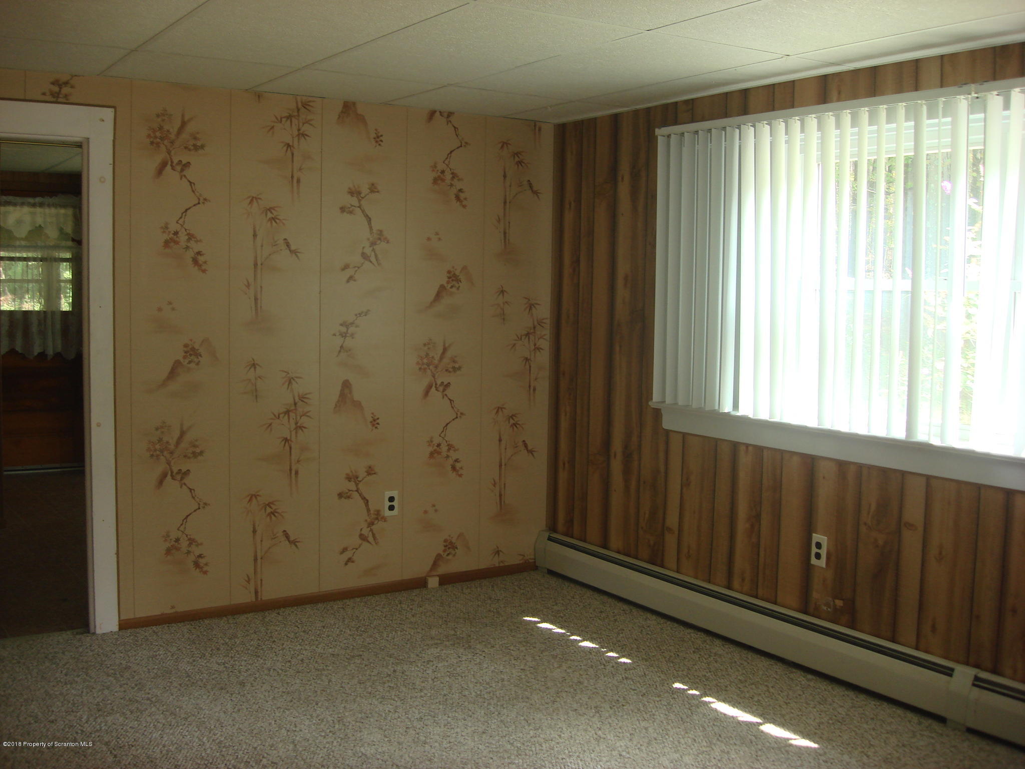252 School House Road Tunkhannock, PA 18657 - Photo 4 of 20 a view of an empty room and window