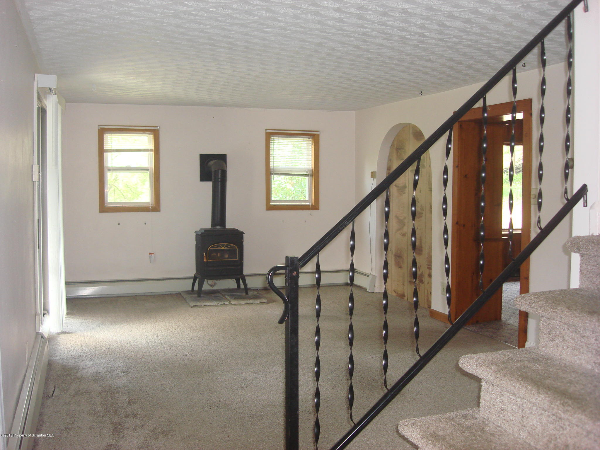 252 School House Road Tunkhannock, PA 18657 - Photo 5 of 20 a view of an entryway with wooden floor and stairs