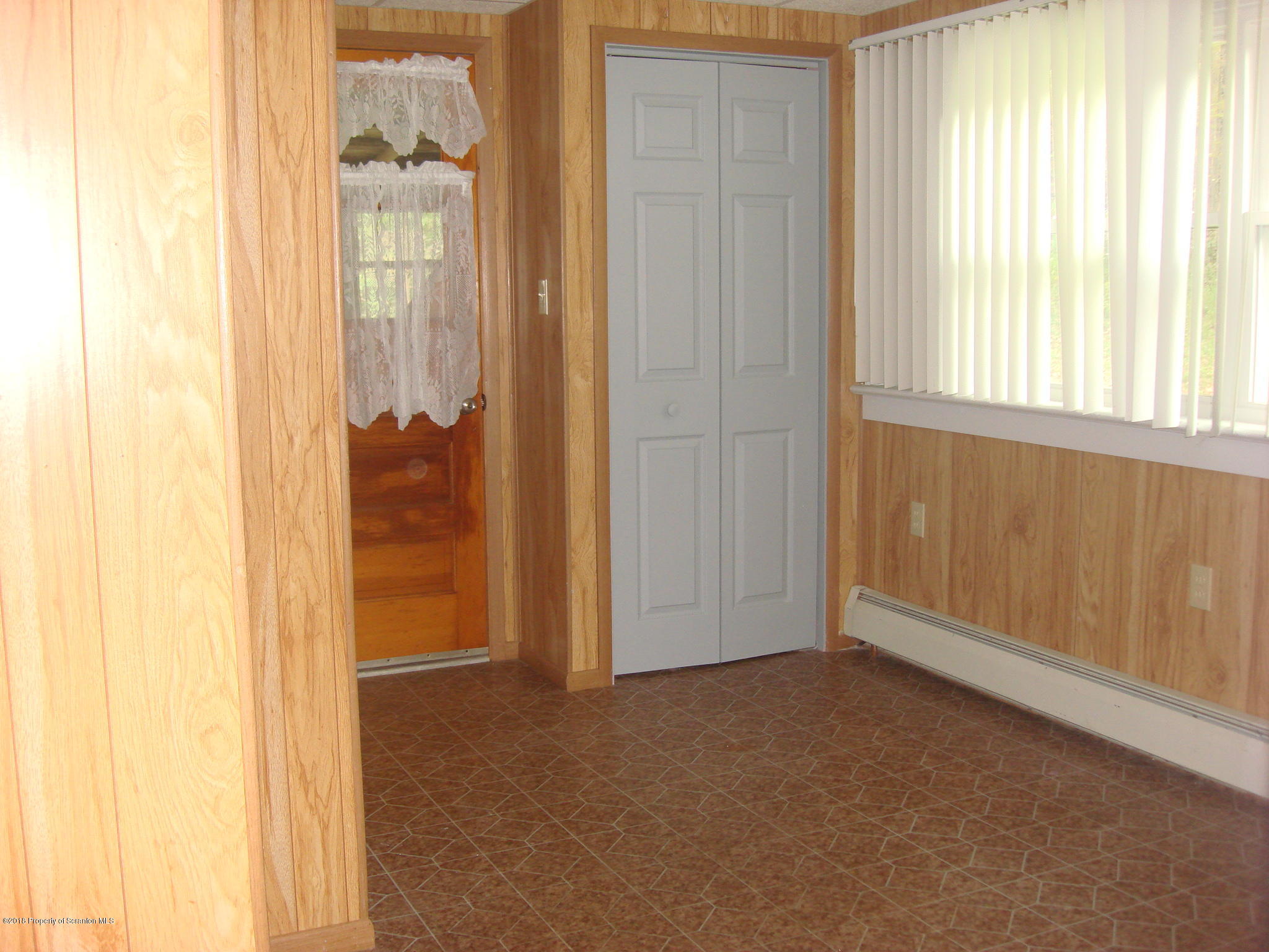 252 School House Road Tunkhannock, PA 18657 - Photo 6 of 20 an empty room with windows