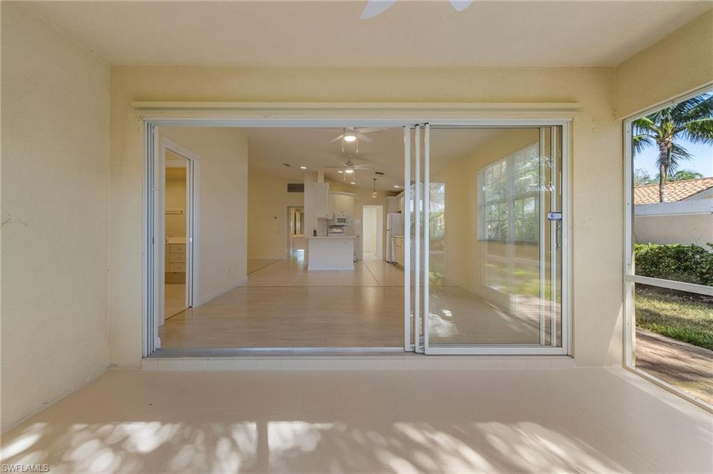 4187 St George Lane Naples, FL 34119 - Photo 21 of 27 View of unfurnished sunroom