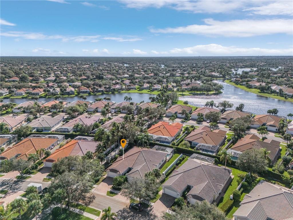4187 St George Lane Naples, FL 34119 - Photo 25 of 27 Aerial view with a water view