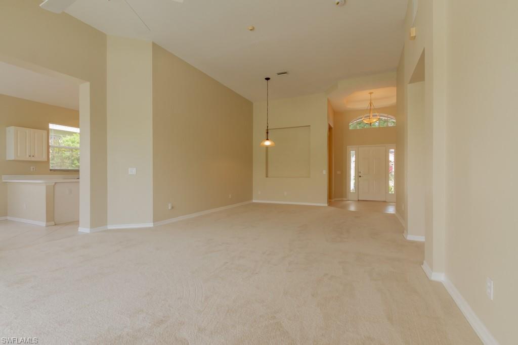 1869 Pondside Lane Naples, FL 34109 - Photo 6 of 35 a view of an empty room