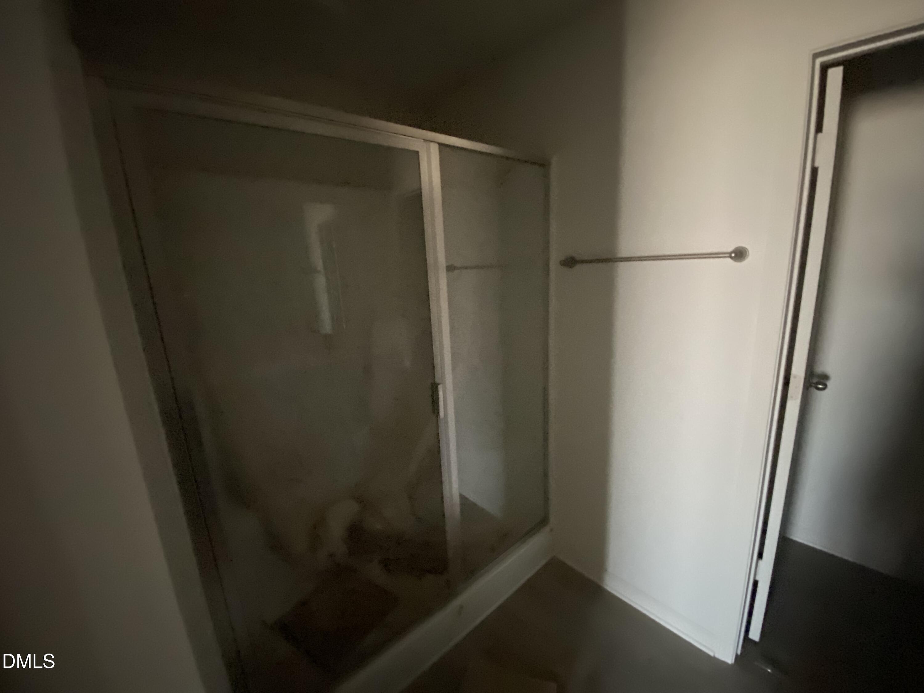 107 Slew Court Fremont, NC 27830 - Photo 11 of 16 a bathroom with a glass shower door