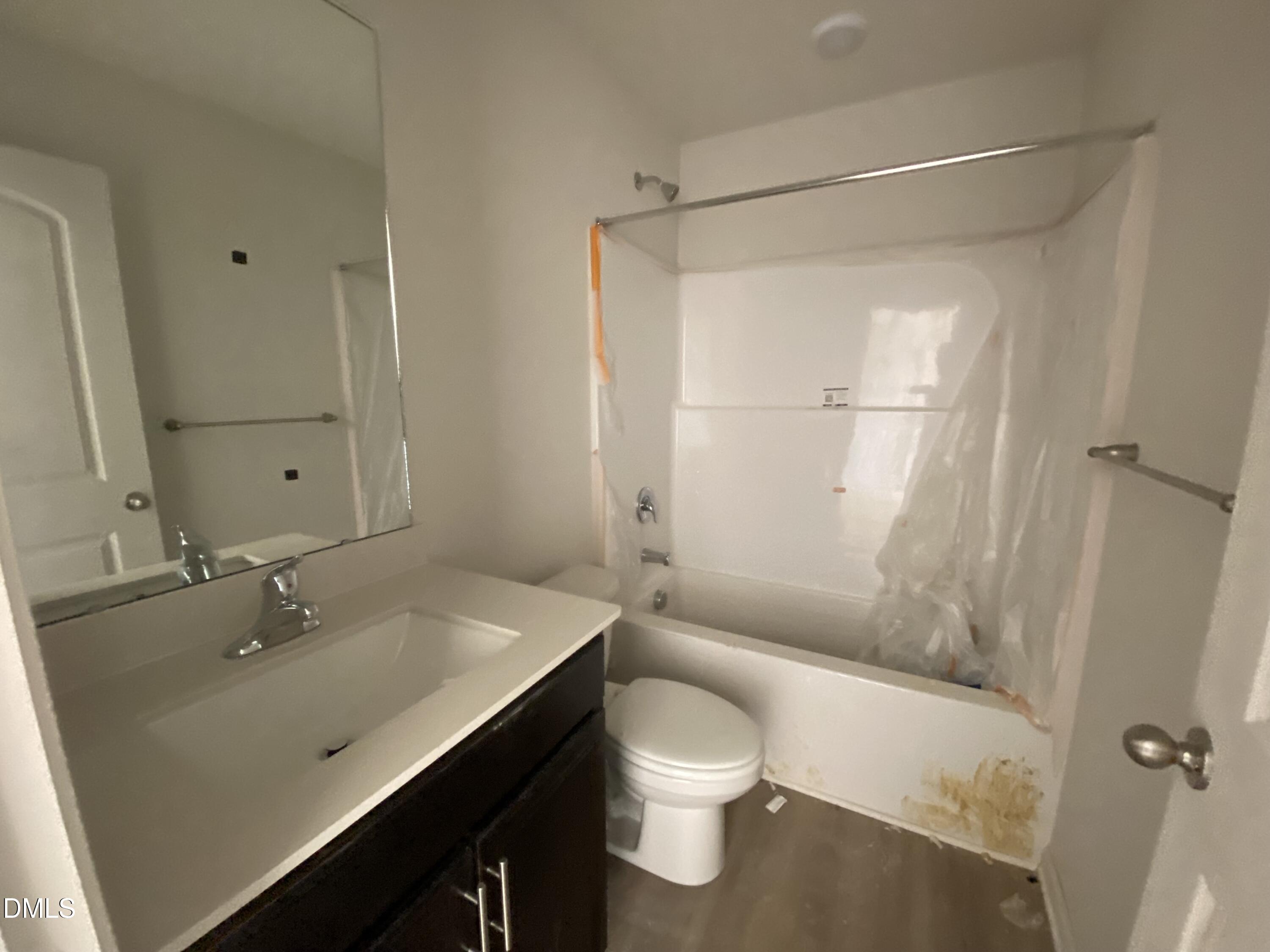 107 Slew Court Fremont, NC 27830 - Photo 13 of 16 a bathroom with a sink a toilet and shower