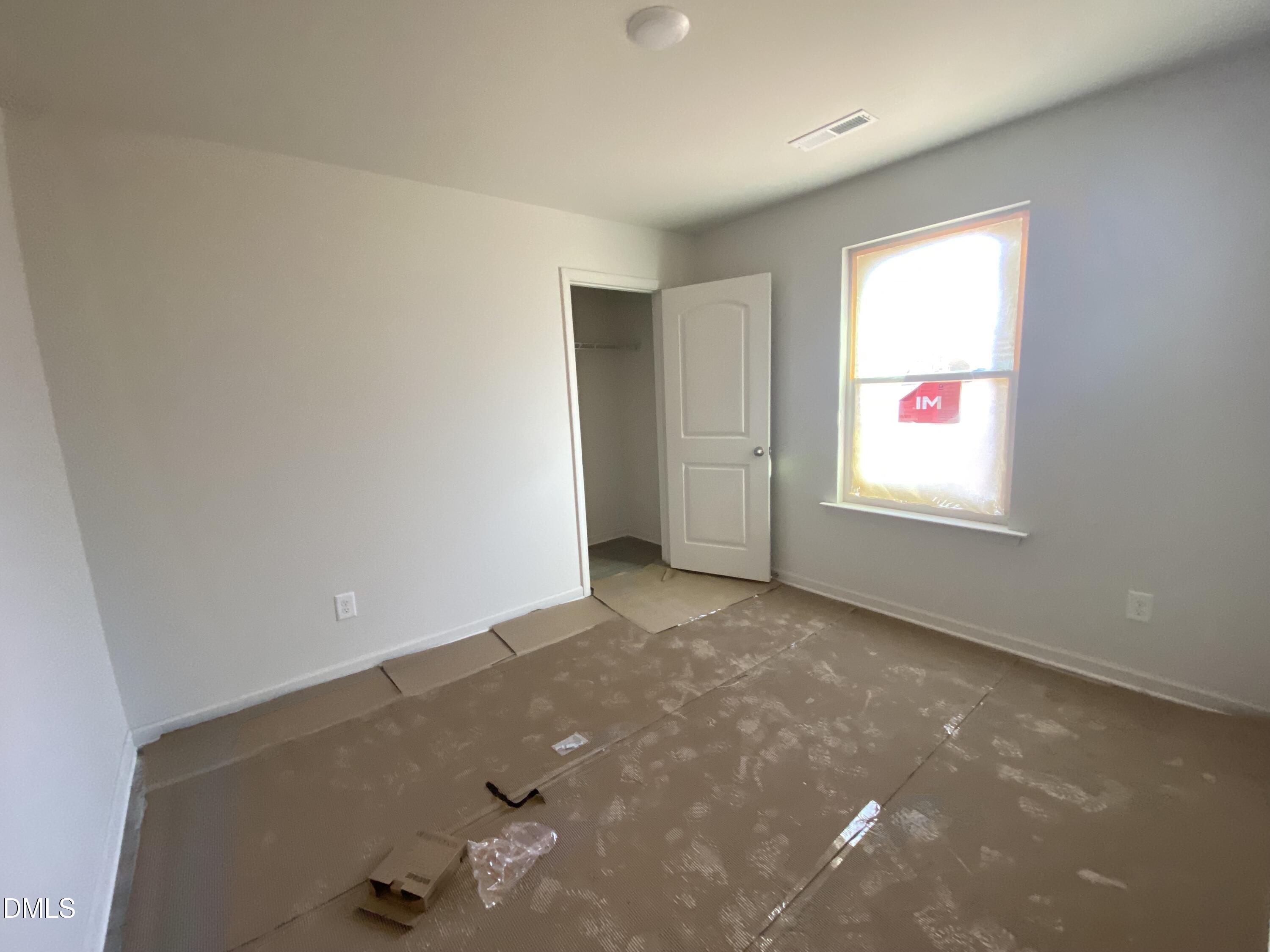 107 Slew Court Fremont, NC 27830 - Photo 14 of 16 an empty room with windows