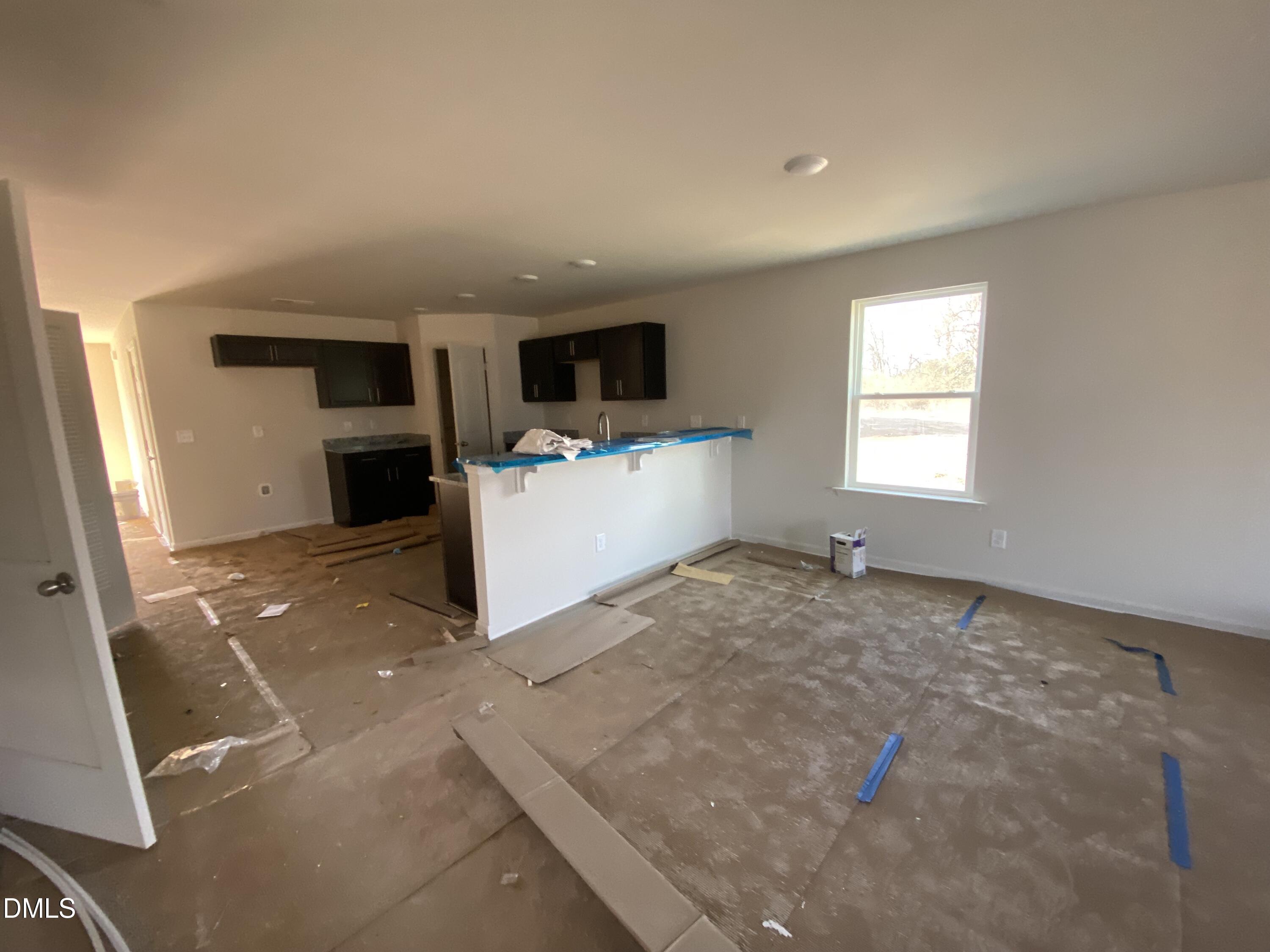 107 Slew Court Fremont, NC 27830 - Photo 7 of 16 a view of a livingroom with a kitchen
