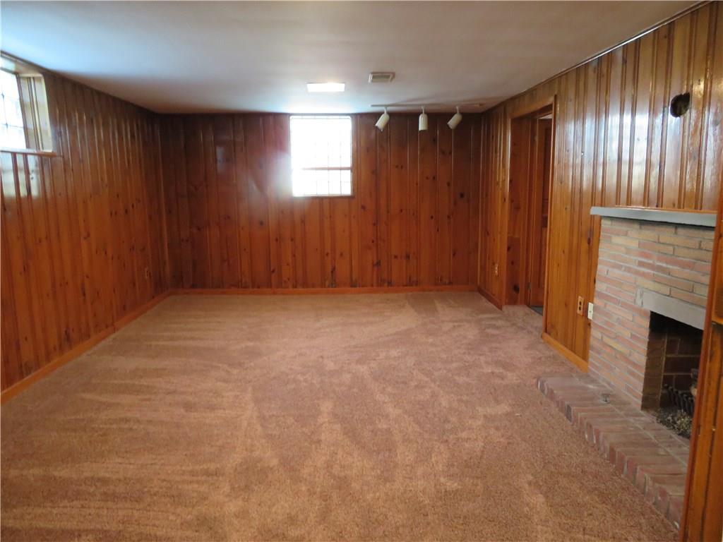 3701 Wayne Road Munhall, PA 15120 - Photo 18 of 20 Large finished game room with cannister lighting and gas fireplace