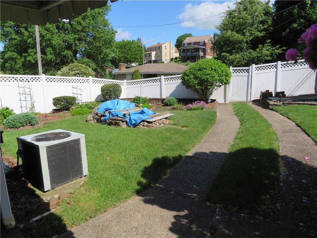 3701 Wayne Road Munhall, PA 15120 - Photo 5 of 20 Side fenced yard with custom fish pond