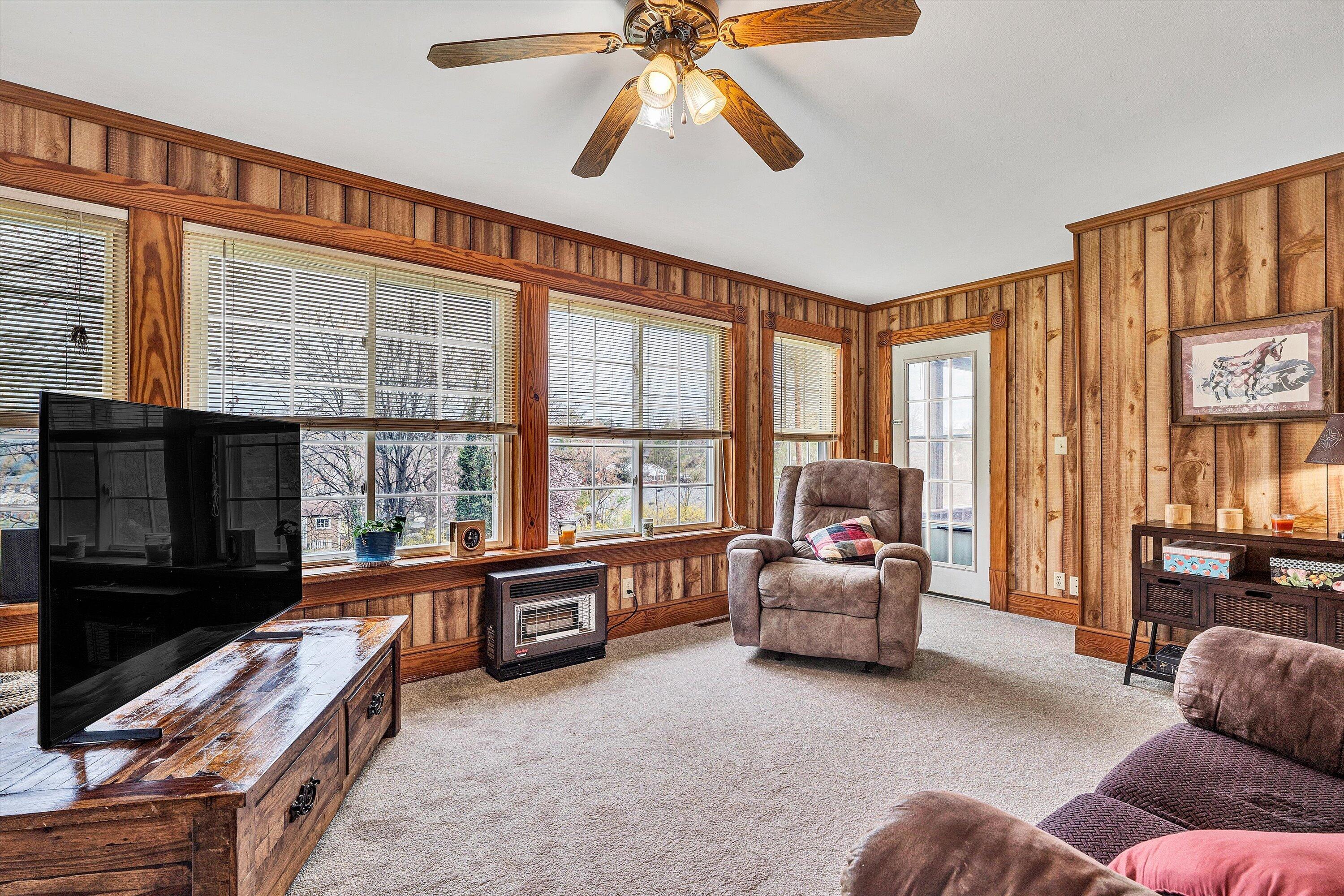 4015 Mud Lick Road Southwest Roanoke, VA 24018 - Photo 11 of 36 a living room with furniture and a flat screen tv