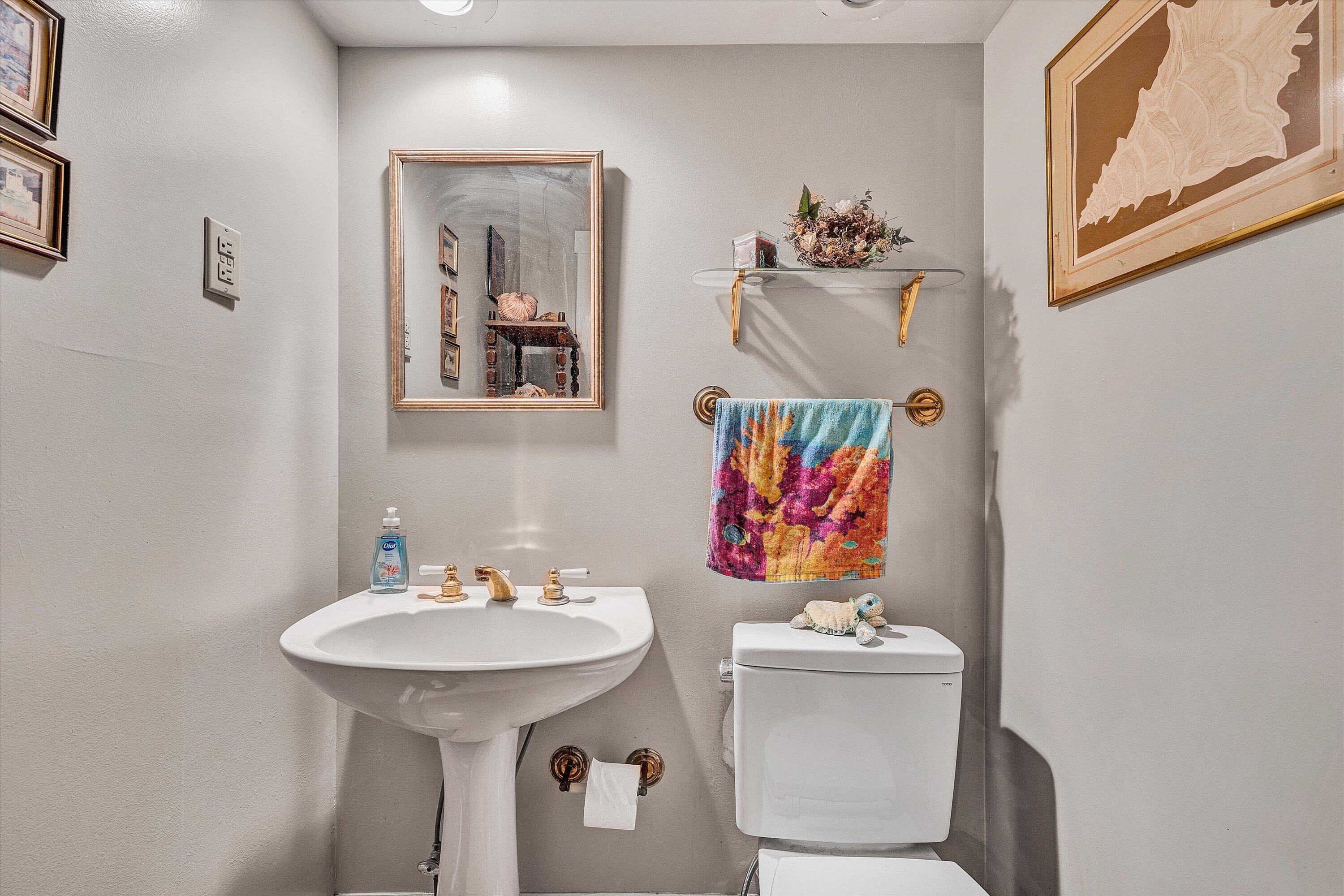 4015 Mud Lick Road Southwest Roanoke, VA 24018 - Photo 16 of 36 a bathroom with a sink and a mirror