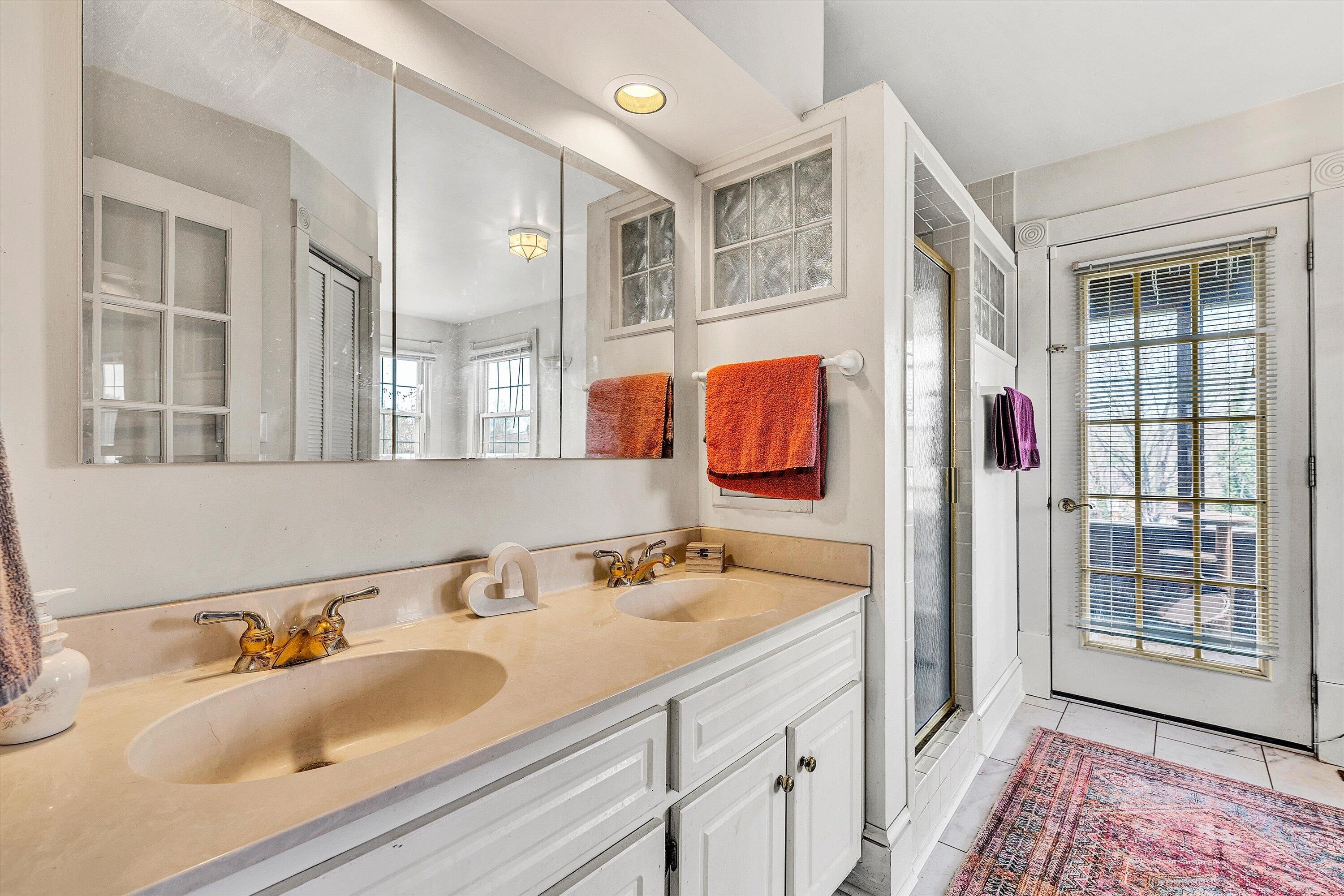 4015 Mud Lick Road Southwest Roanoke, VA 24018 - Photo 20 of 36 a bathroom with a sink and a mirror