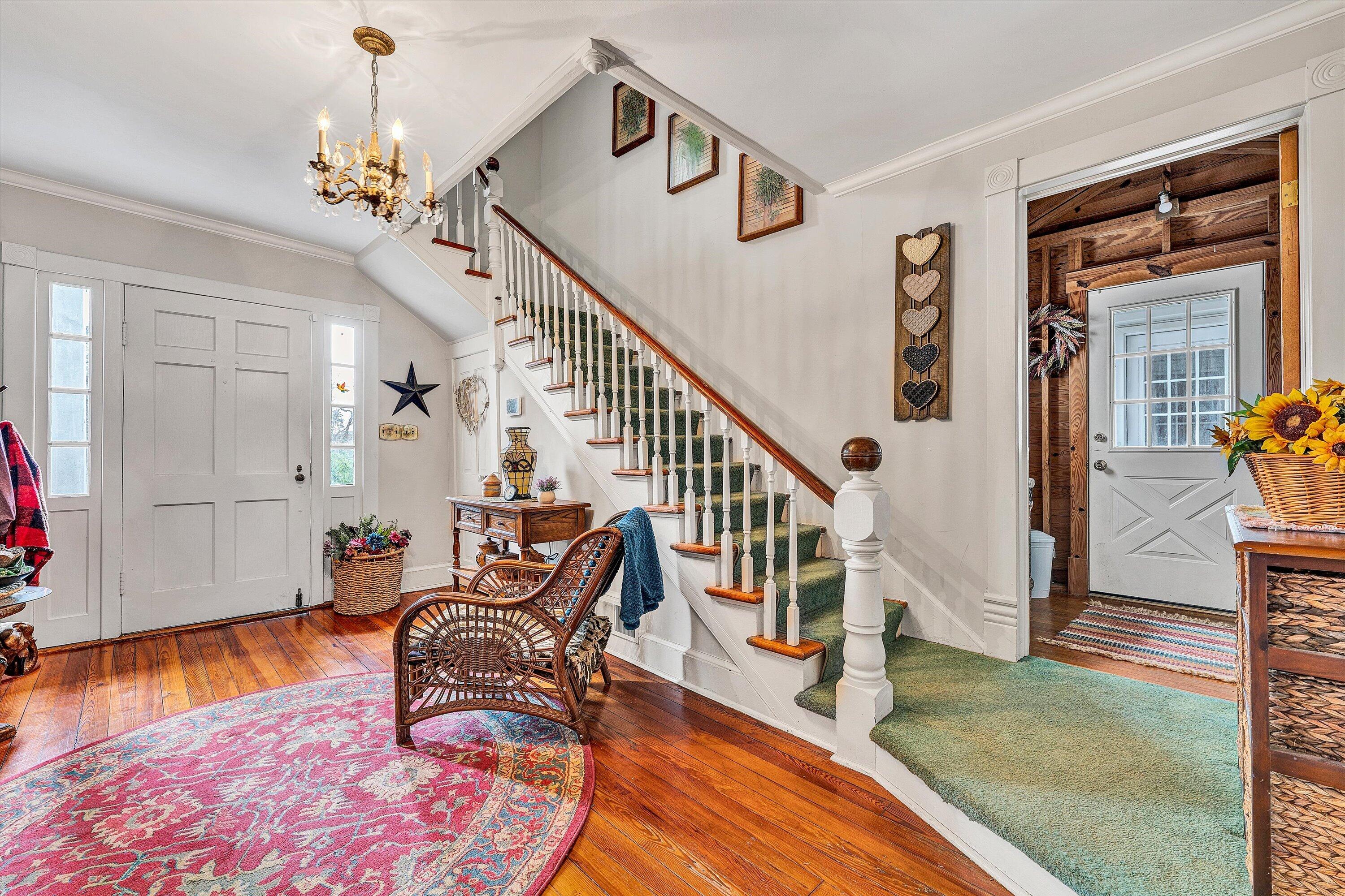 4015 Mud Lick Road Southwest Roanoke, VA 24018 - Photo 4 of 36 a living room with furniture and a dining table