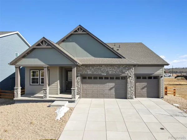a front view of a house with a garage