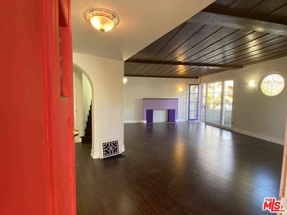 4247 9th Avenue Los Angeles, CA 90008 - Photo 13 of 45 a view of a hall with wooden floor
