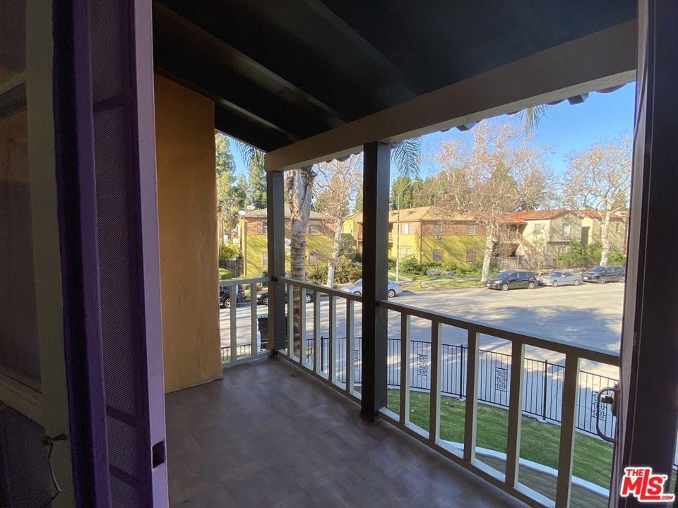 4247 9th Avenue Los Angeles, CA 90008 - Photo 29 of 45 a view of a glass door and the balcony