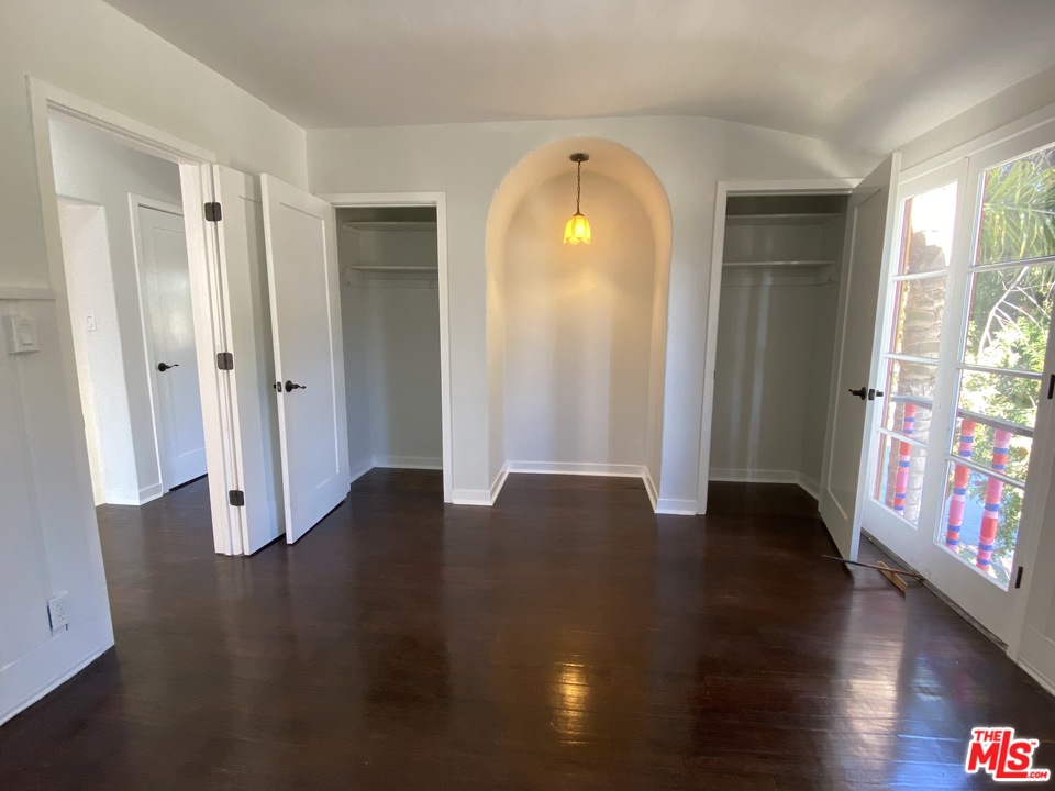 4247 9th Avenue Los Angeles, CA 90008 - Photo 32 of 45 a view of a living room with hardwood floor and a window