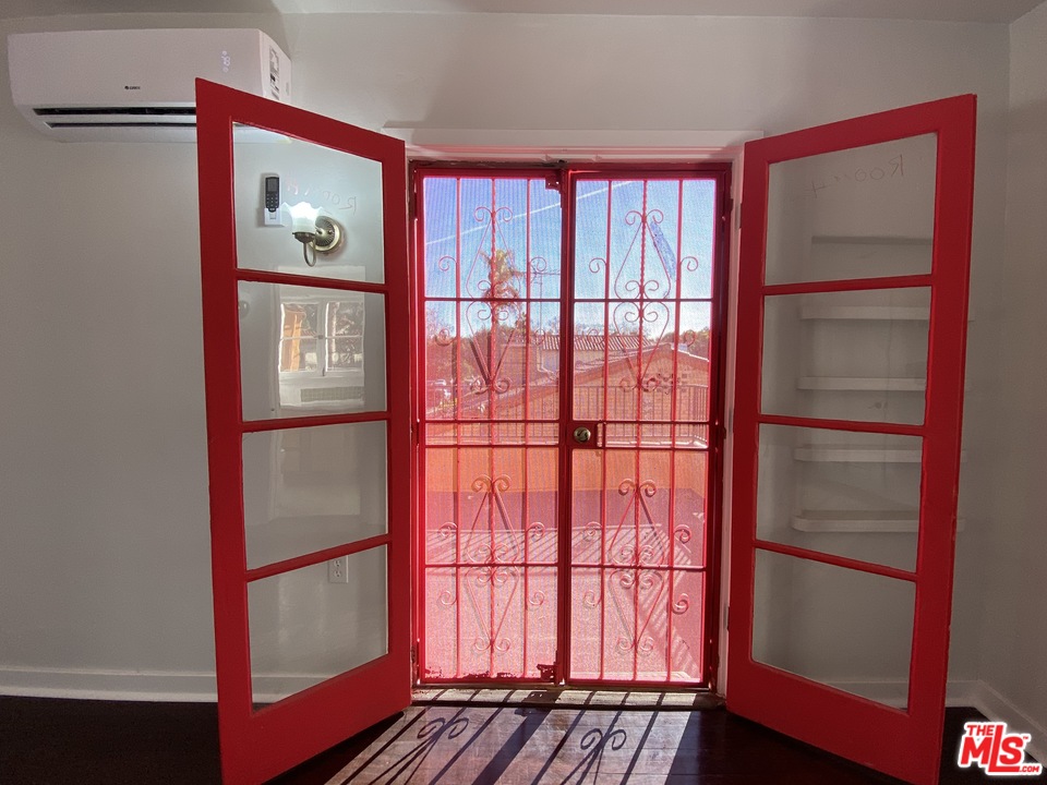 4247 9th Avenue Los Angeles, CA 90008 - Photo 35 of 45 a view of front door with wooden floor
