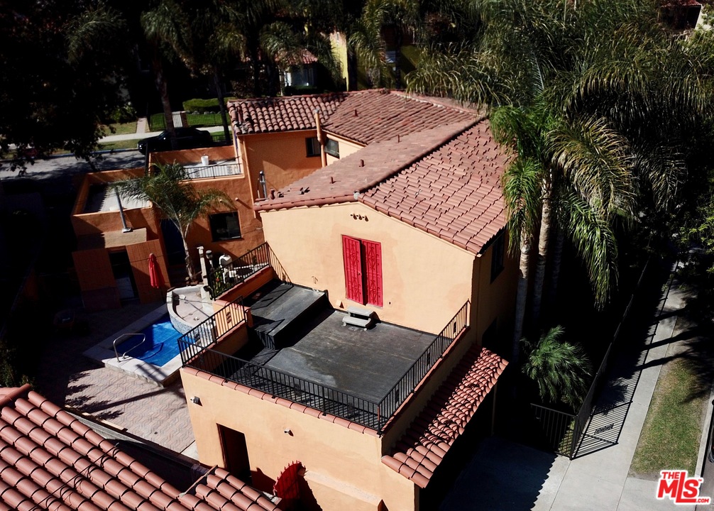 4247 9th Avenue Los Angeles, CA 90008 - Photo 43 of 45 an outdoor space with seating area and trees