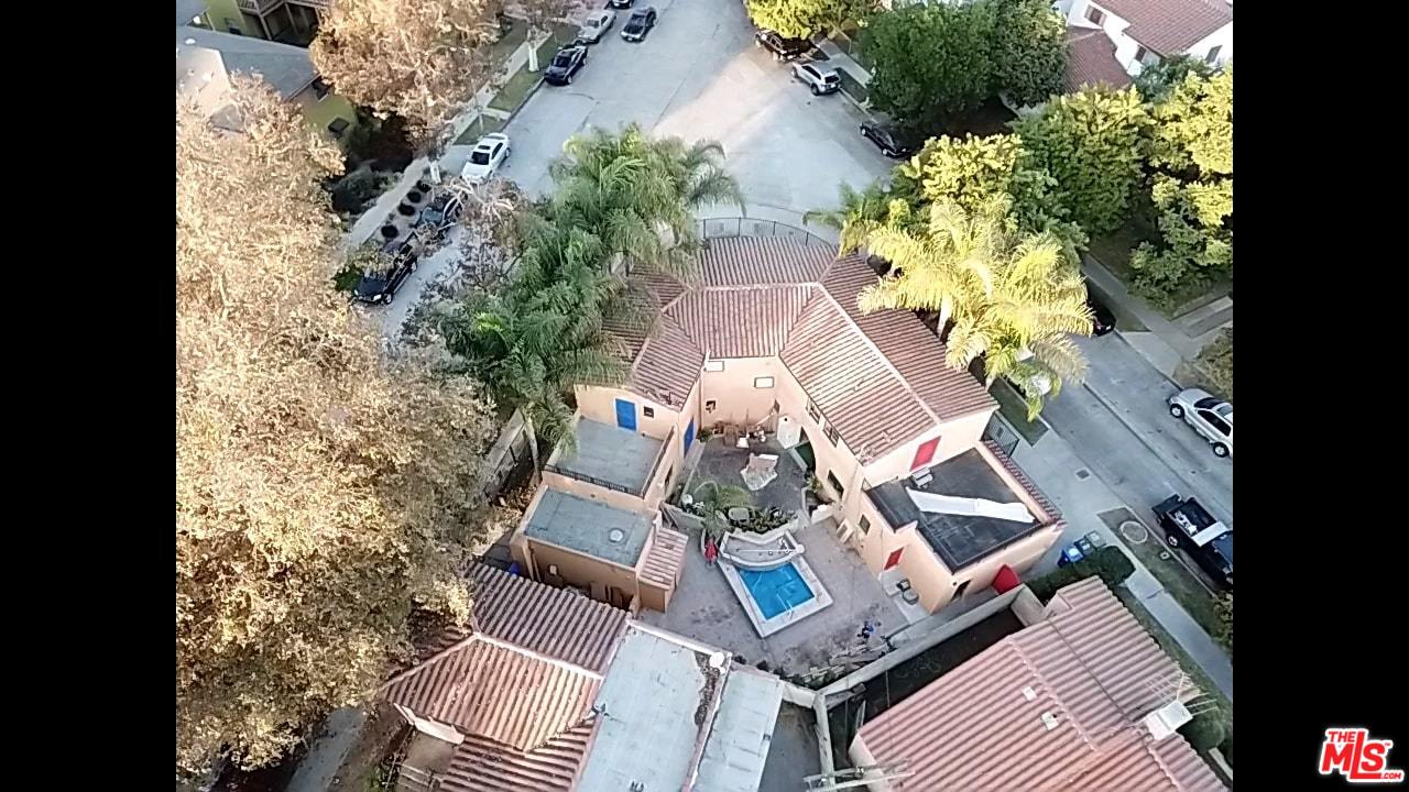 4247 9th Avenue Los Angeles, CA 90008 - Photo 44 of 45 an aerial view of a house with outdoor space