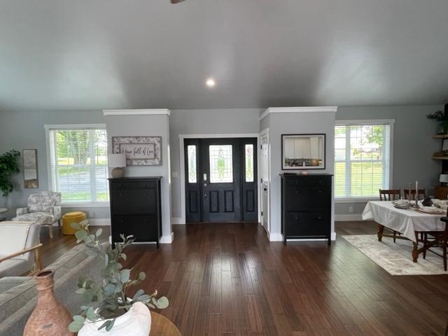 2149 Kingview Road Scottdale, PA 15683 - Photo 2 of 31 a living room with furniture a fireplace and a flat screen tv