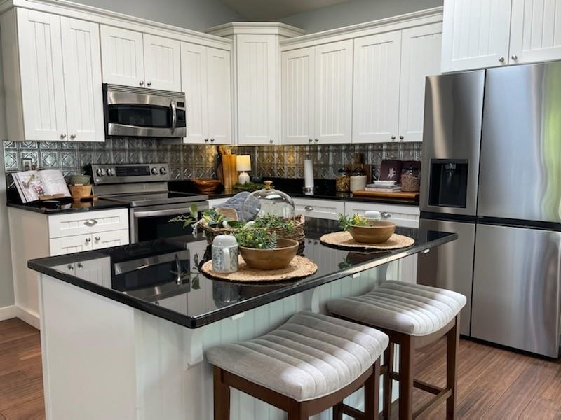 2149 Kingview Road Scottdale, PA 15683 - Photo 8 of 31 a kitchen with a dining table and chairs