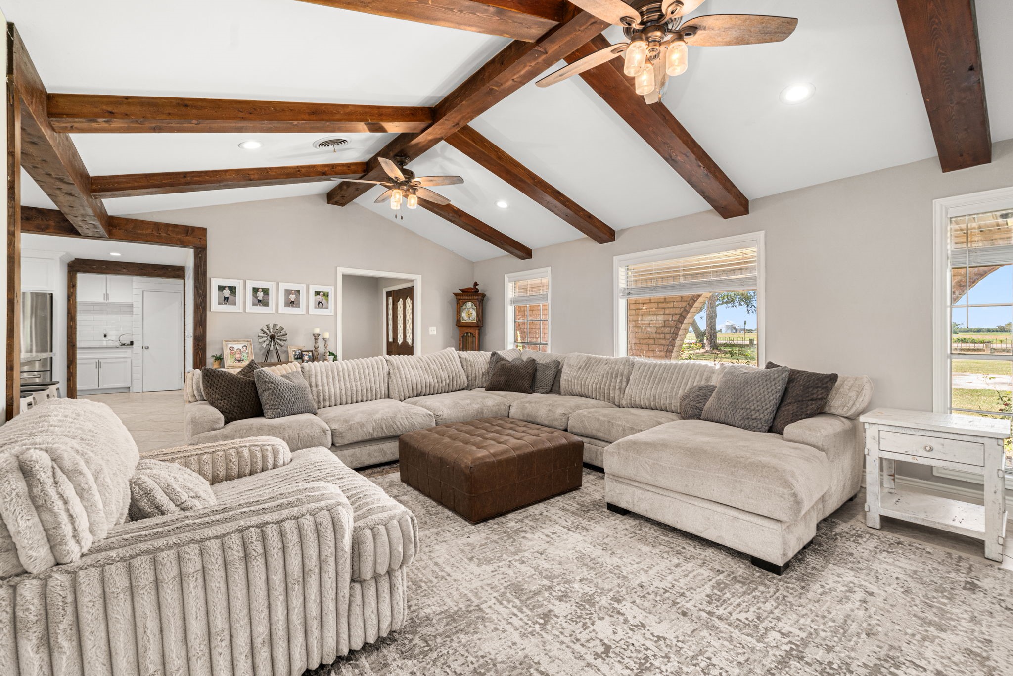 3148 FM 333 Road Garwood, TX 77442 - Photo 11 of 50 a living room with furniture and a ceiling fan