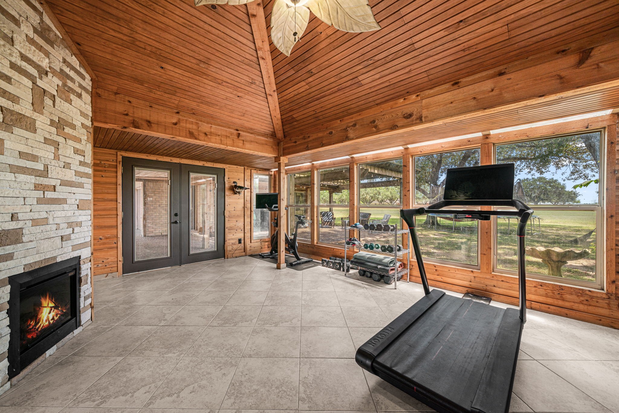 3148 FM 333 Road Garwood, TX 77442 - Photo 19 of 50 a view of a room with wooden floor and iron fence