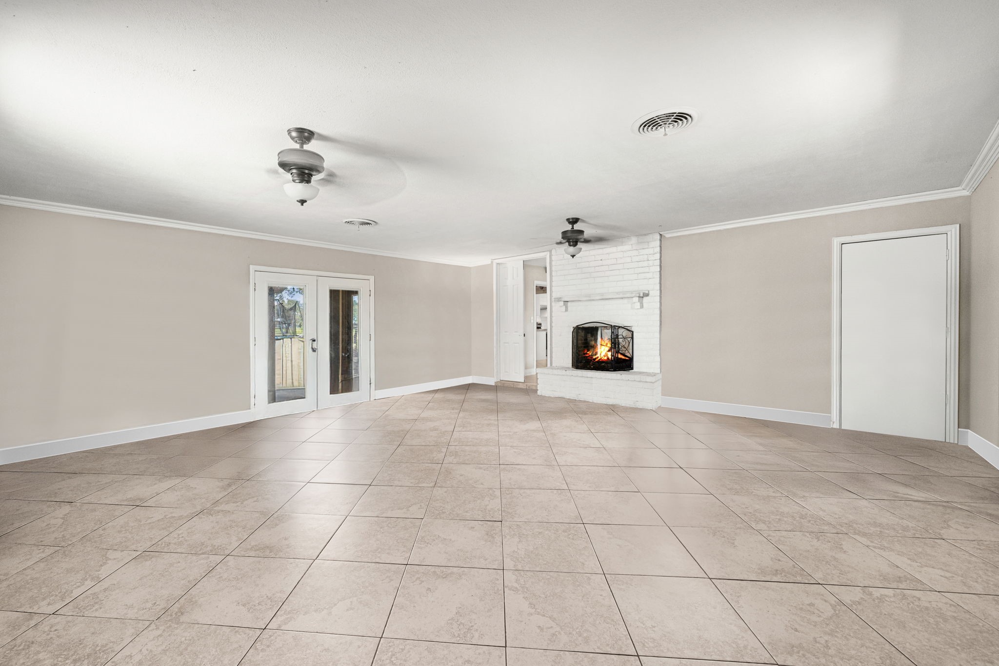 3148 FM 333 Road Garwood, TX 77442 - Photo 20 of 50 a view of a livingroom with a fireplace and a window
