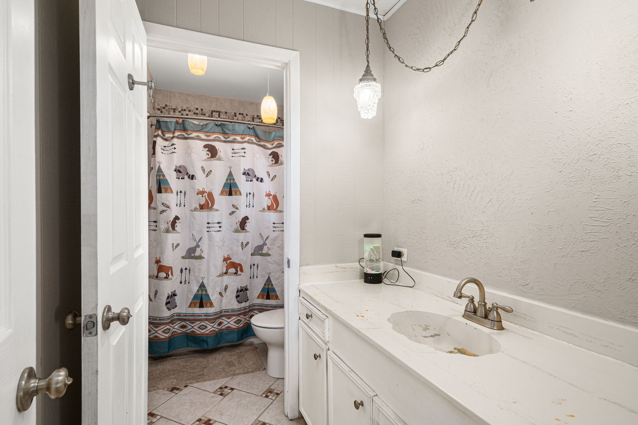 3148 FM 333 Road Garwood, TX 77442 - Photo 26 of 50 a bathroom with a sink a toilet and shower
