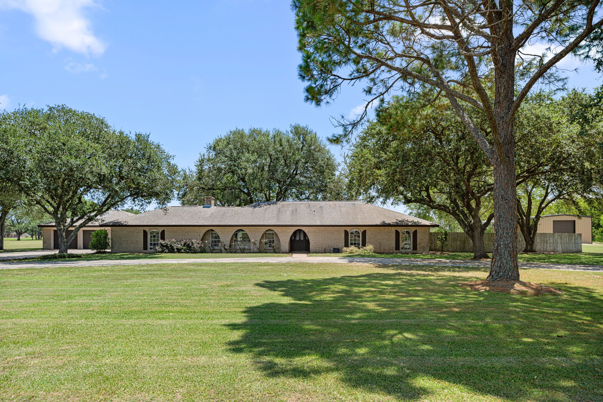 3148 FM 333 Road Garwood, TX 77442 - Photo 4 of 50 a view of swimming pool with outdoor seating and trees