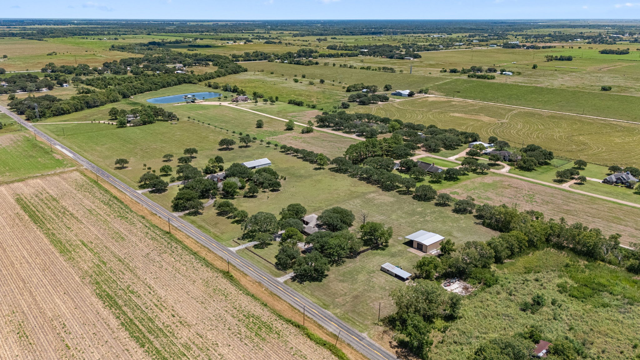 3148 FM 333 Road Garwood, TX 77442 - Photo 42 of 50 an aerial view of ocean and residential houses with outdoor space