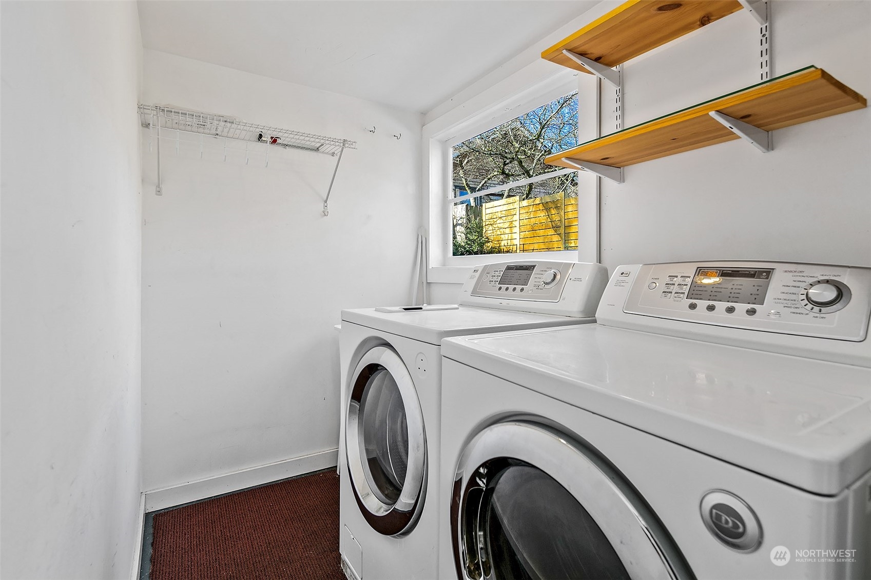 4415 Eastern Avenue North Seattle, WA 98103 - Photo 15 of 27 a utility room with dryer and washer