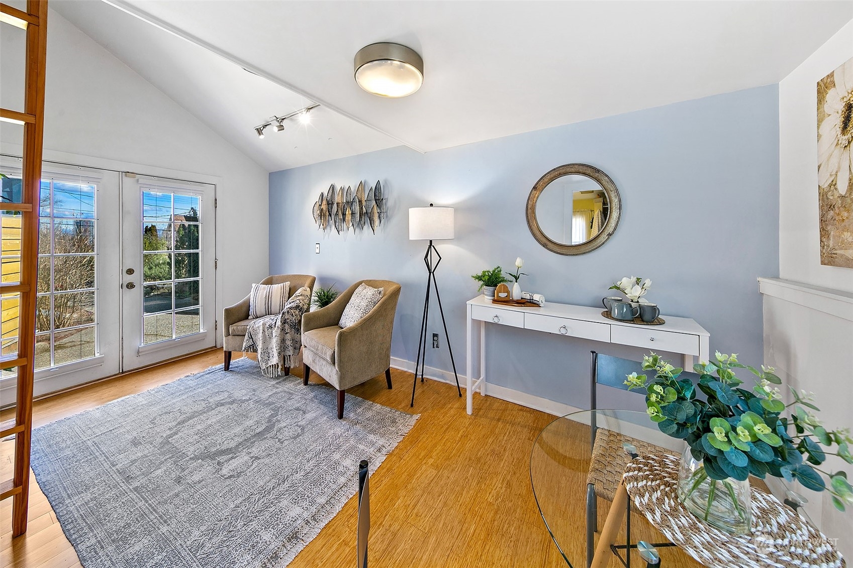 4415 Eastern Avenue North Seattle, WA 98103 - Photo 16 of 27 a living room with a table and a potted plant