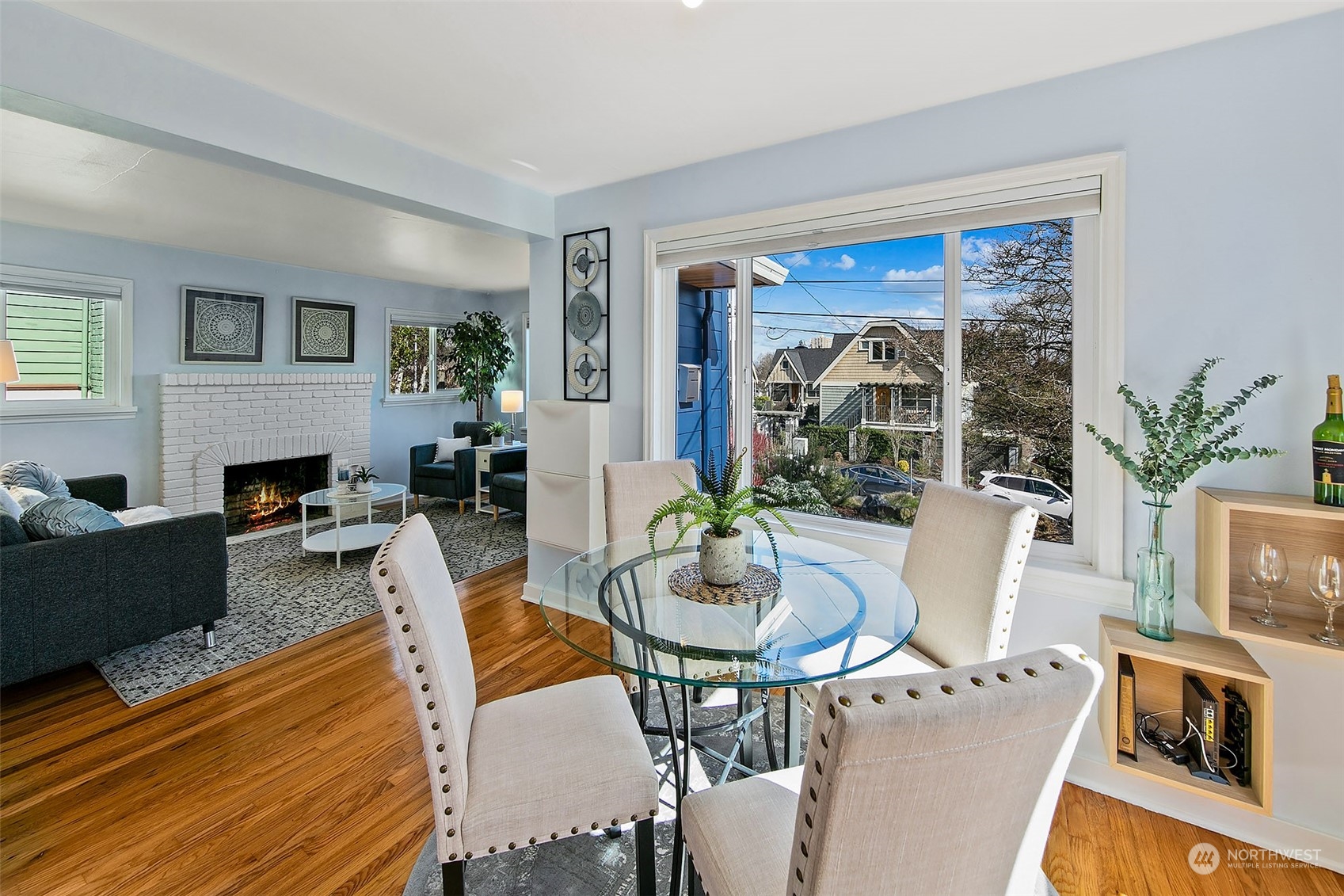 4415 Eastern Avenue North Seattle, WA 98103 - Photo 6 of 27 a living room with furniture fireplace and a large window