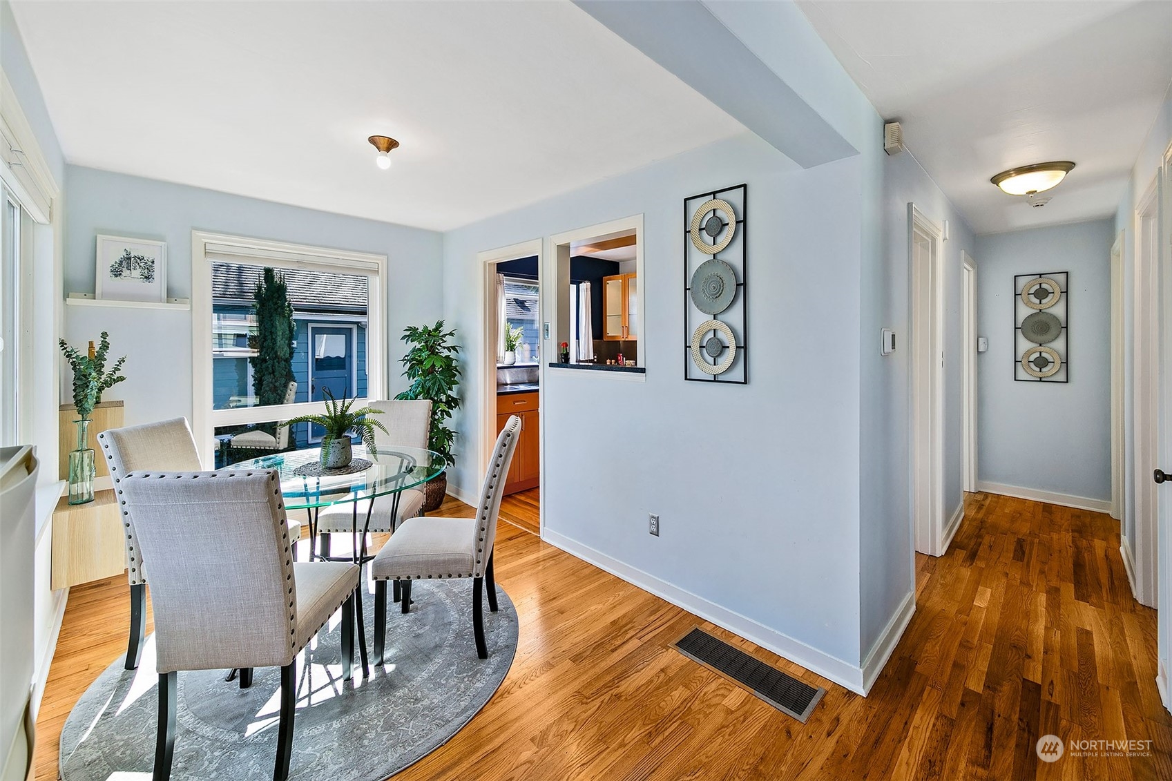 4415 Eastern Avenue North Seattle, WA 98103 - Photo 8 of 27 a view of a dining room with furniture window and wooden floor