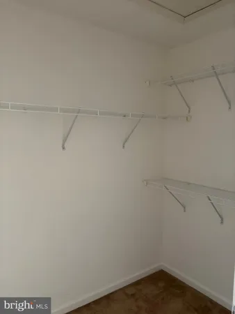 a view of a room with racks on the wall